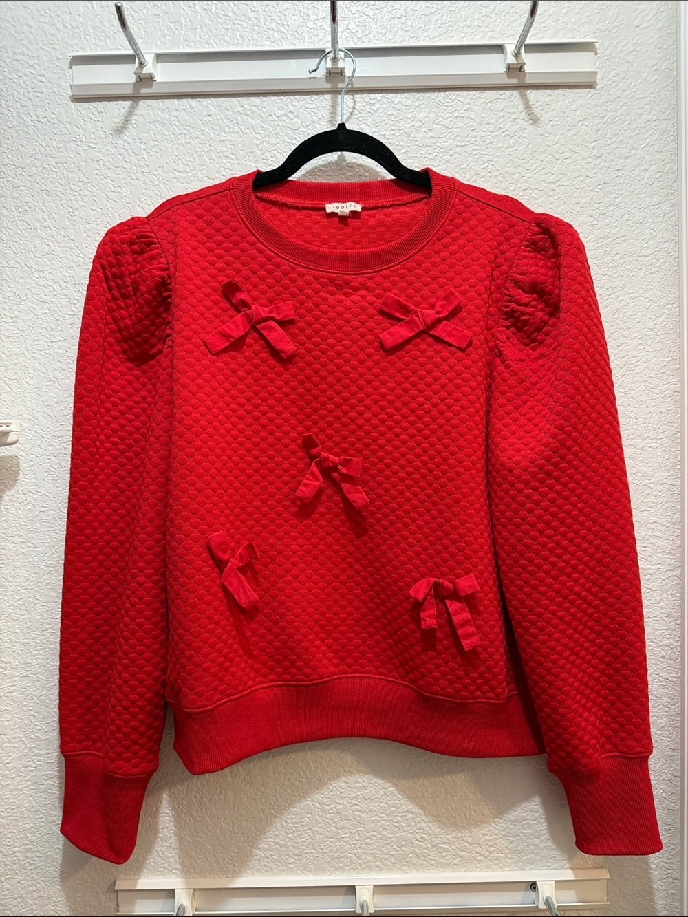 JODIFL Red Quilted Crewneck Sweater with Bow Accents